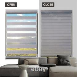 Store de fenêtre horizontal à double rouleau zébré filtrant la lumière avec coupe personnalisée.